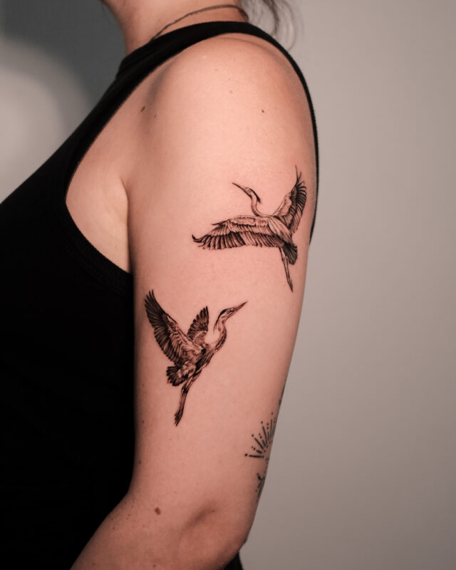 Black and grey crane tattoo in Hanoi
