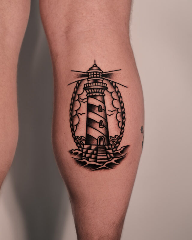 Old school lighthouse tattoo in Hanoi by Azone Tattoo Studio