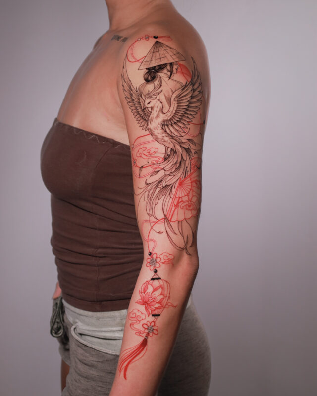 Vietnamese fine line tattoo featuring a woman in a conical hat, bird and lantern details on the arm by Azone Tattoo Studio in Saigon