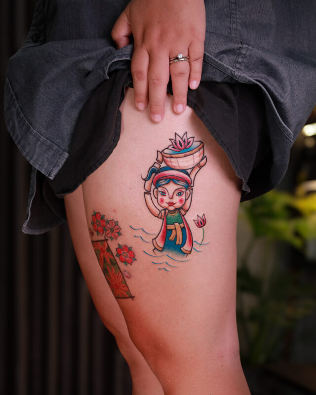 Color Vietnamese girl tattoo with lotus by Azone Tattoo Studio in Hanoi and Saigon