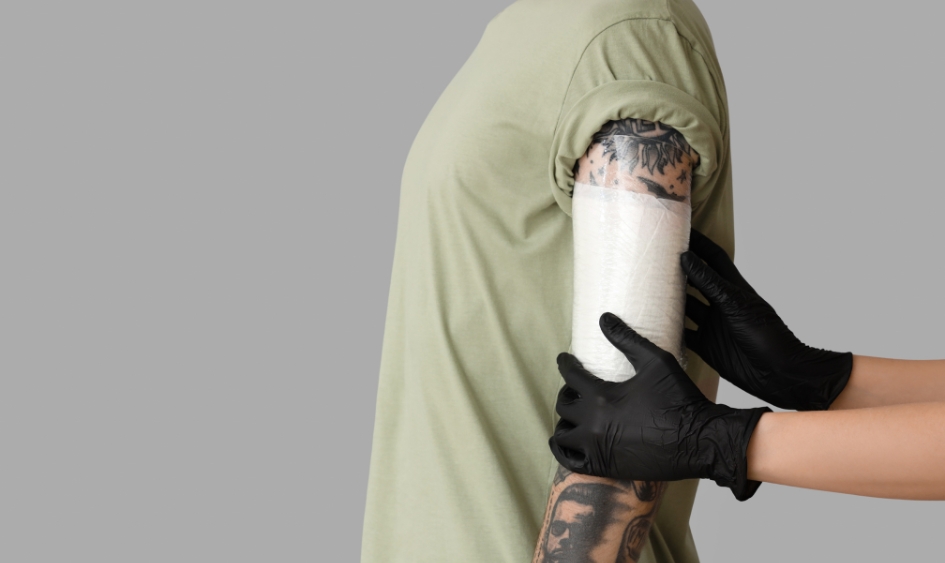 artist will cover the tattoo with a sterile bandage or film wrap