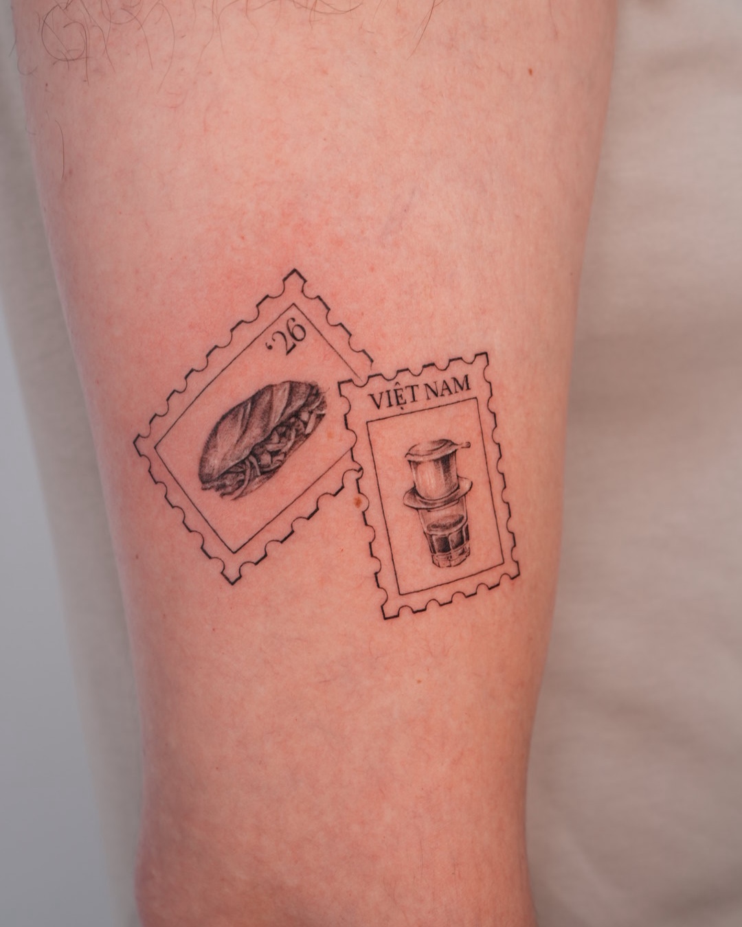 Vietnam postage stamp tattoo inspired by Vietnamese travel by Azone Tattoo Studio