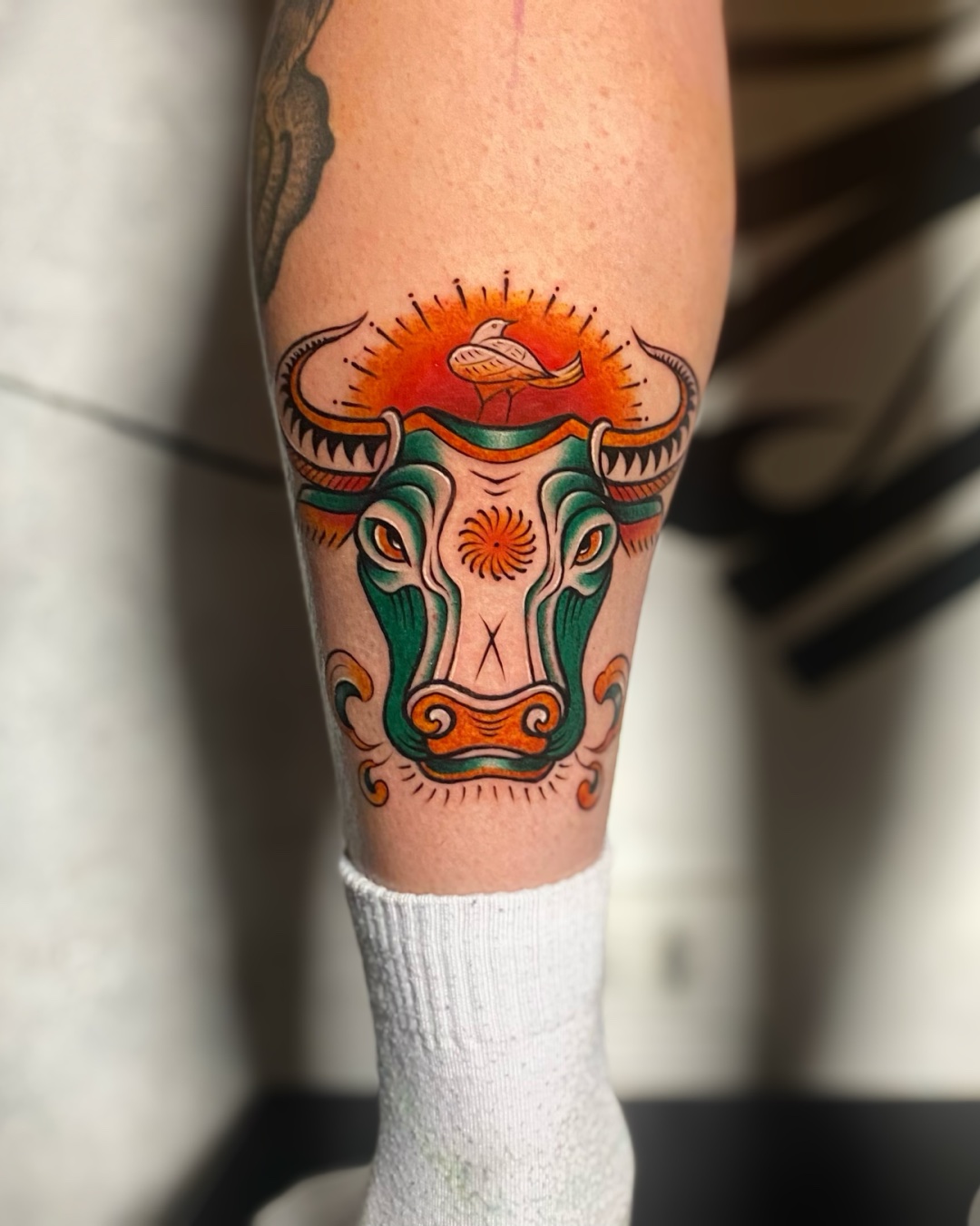 Vietnamese folk buffalo tattoo by Azone Tattoo Studio